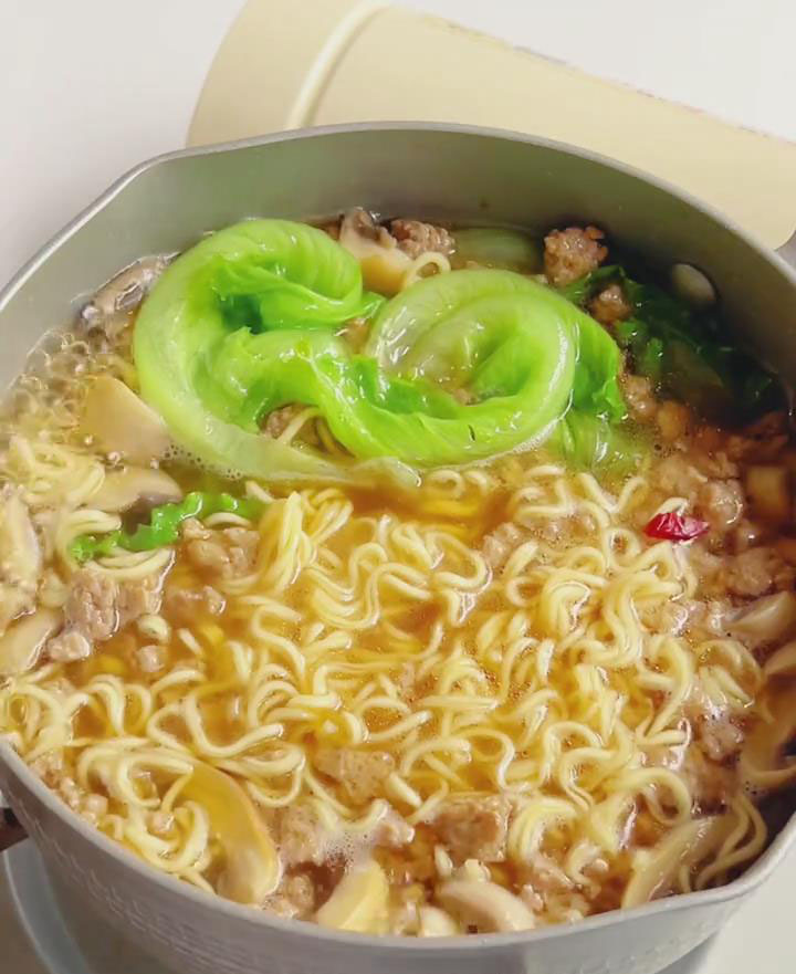 Add lettuce and blanch for 30 seconds until slightly wilted