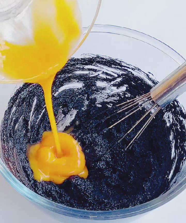 Add the egg yolks one at a time