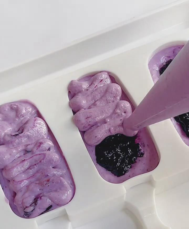 Continue piping to fill the molds completely new