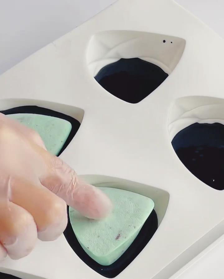 Pipe mousse mixture into the molds until about halfway full