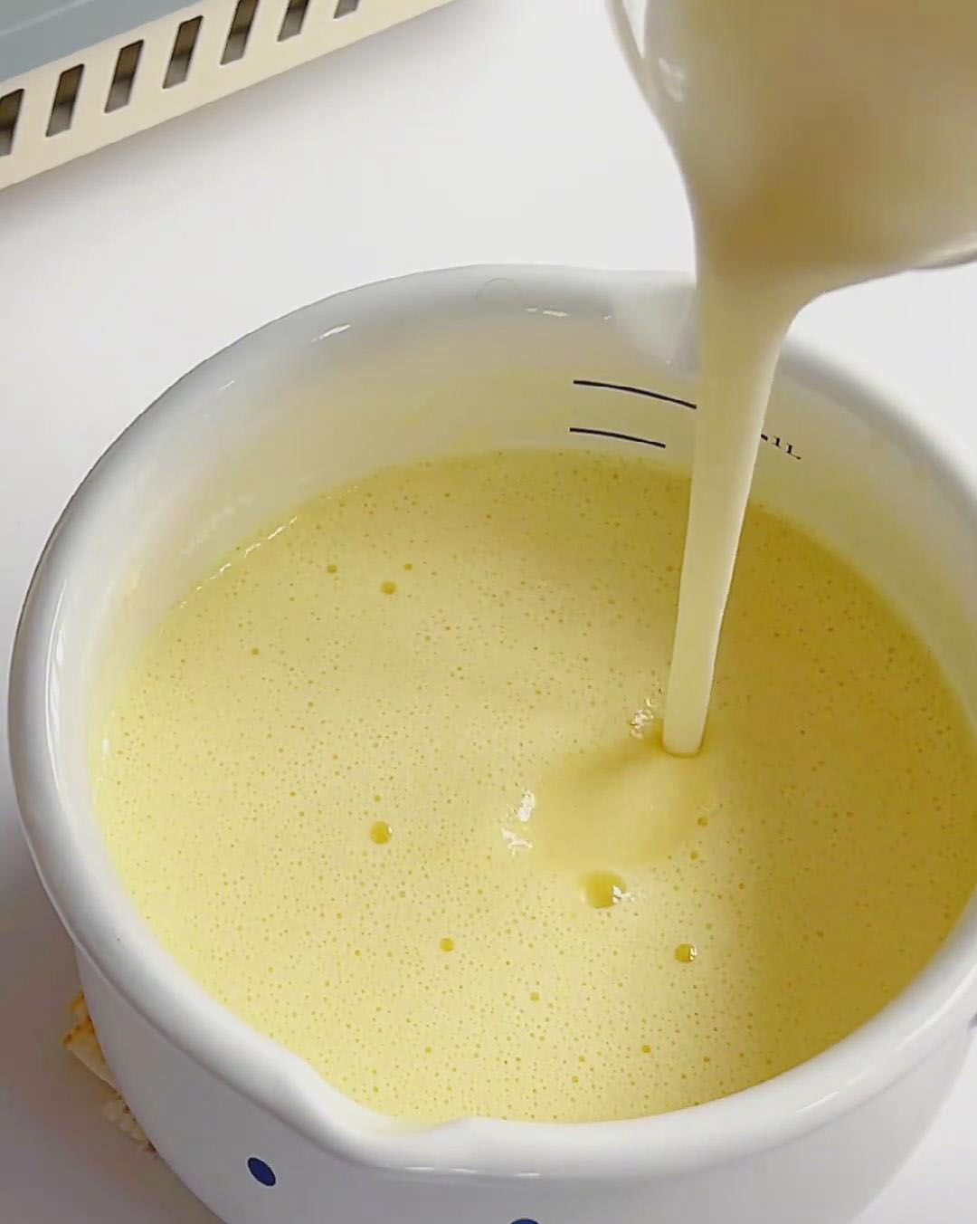 Add the yogurt mixture to the egg milk mixture