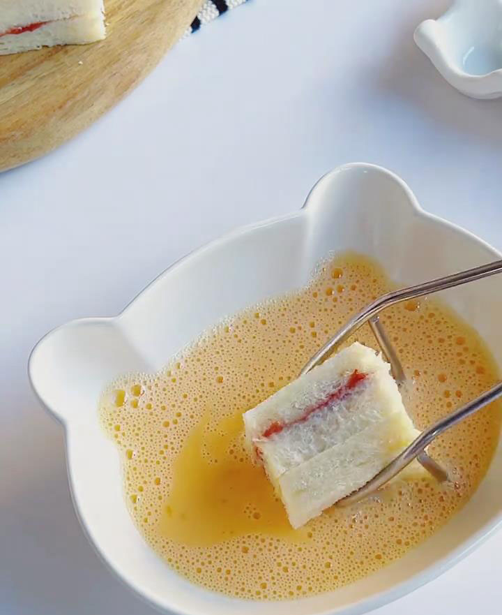 Dip each bread piece into the egg mixture