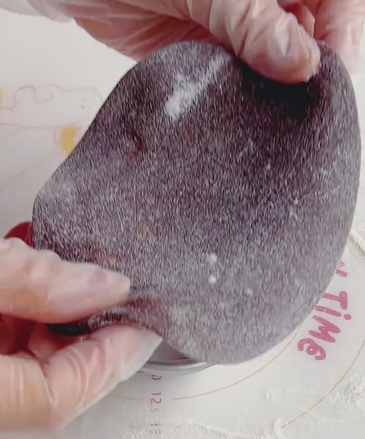 Gently lay the rolled dough inside the bowl