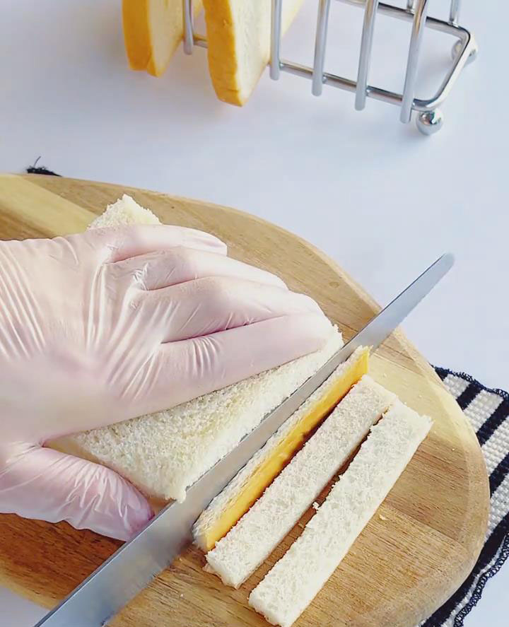Trim the crusts from the bread slices