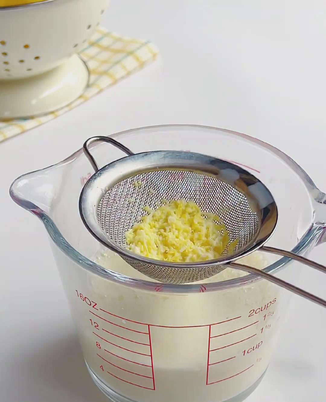 Use a fine mesh strainer to strain the milk into a bowl