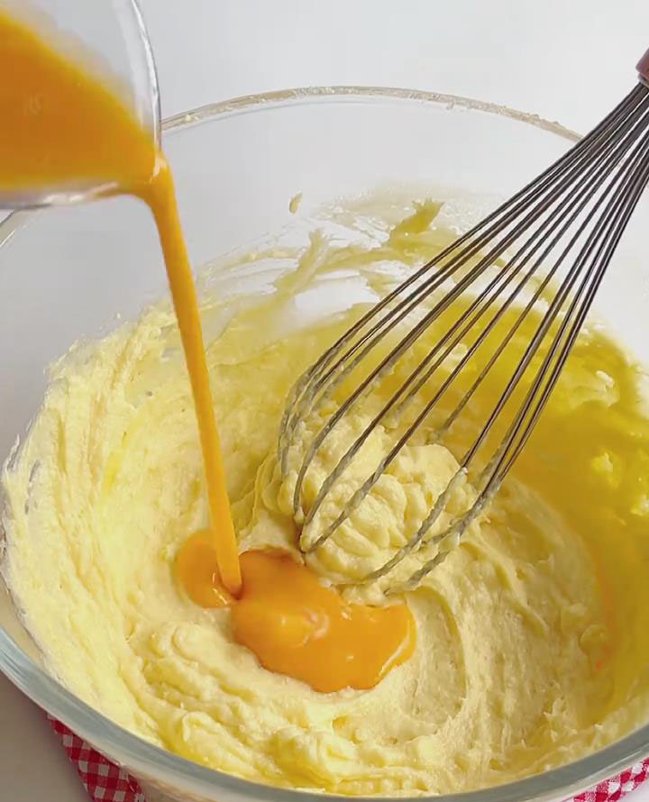 Add eggs and yolk in 3 parts