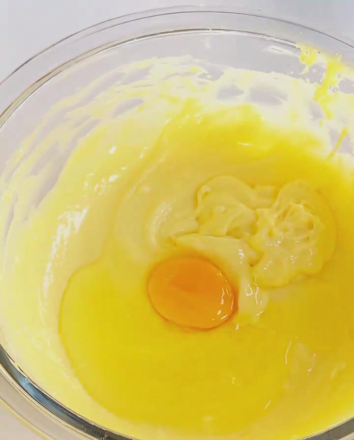 Add eggs one at a time, mixing well after each addition