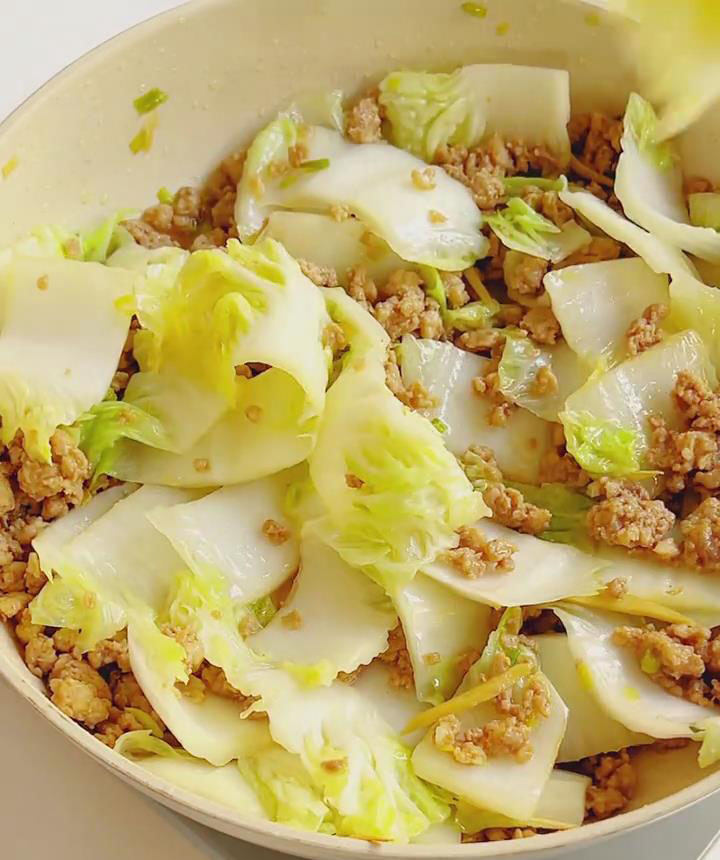Add the cabbage stems to the wok