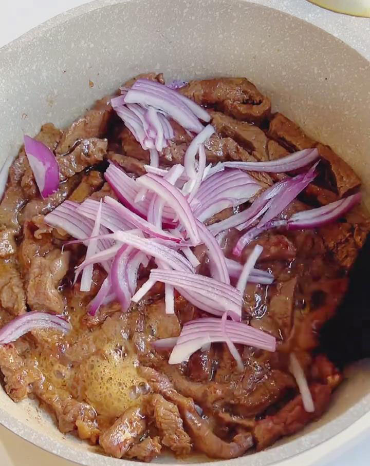 Add the sliced onion