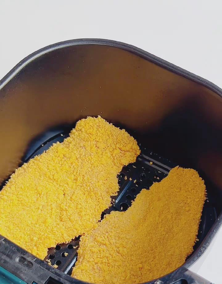 Arrange the breaded chicken cutlets in a single layer in the air fryer basket