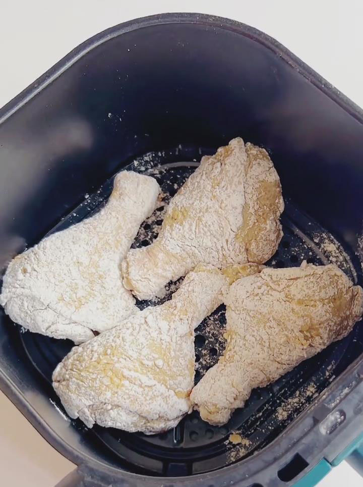 Arrange the coated drumsticks in a single layer in the air fryer basket