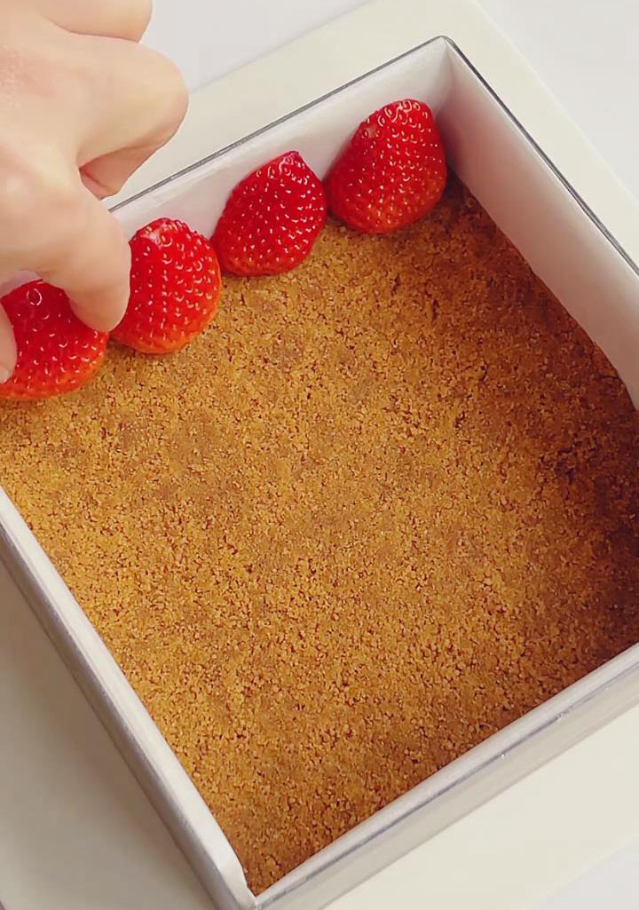 Arrange the halved strawberries