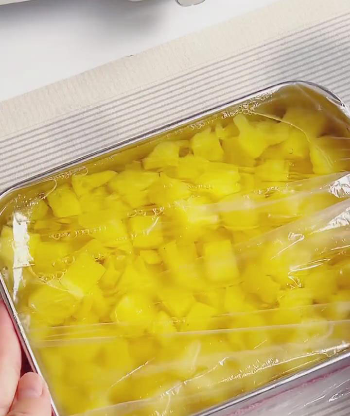 Cover the container of cooled pineapple (with some syrup) with plastic wrap