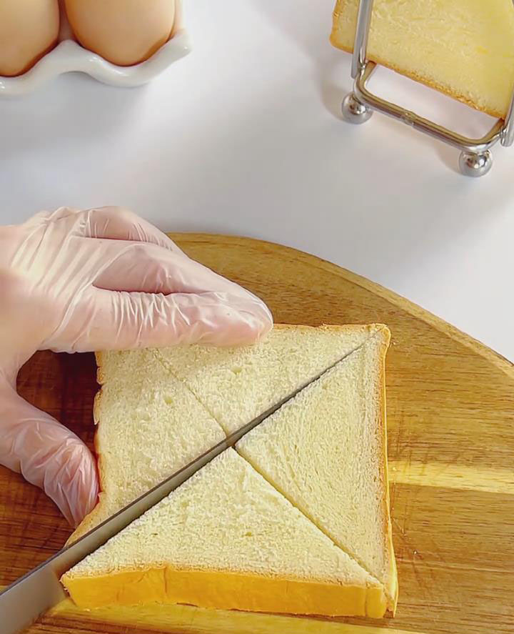 Cut the toast into triangles
