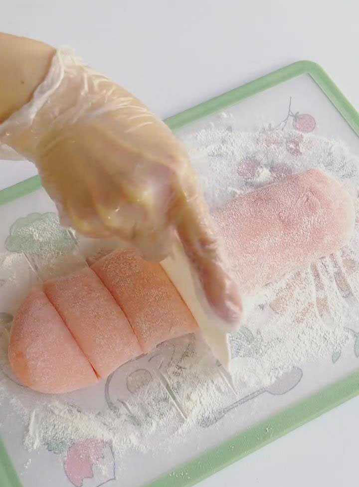 Divide the large dough ball into 9 equal smaller pieces