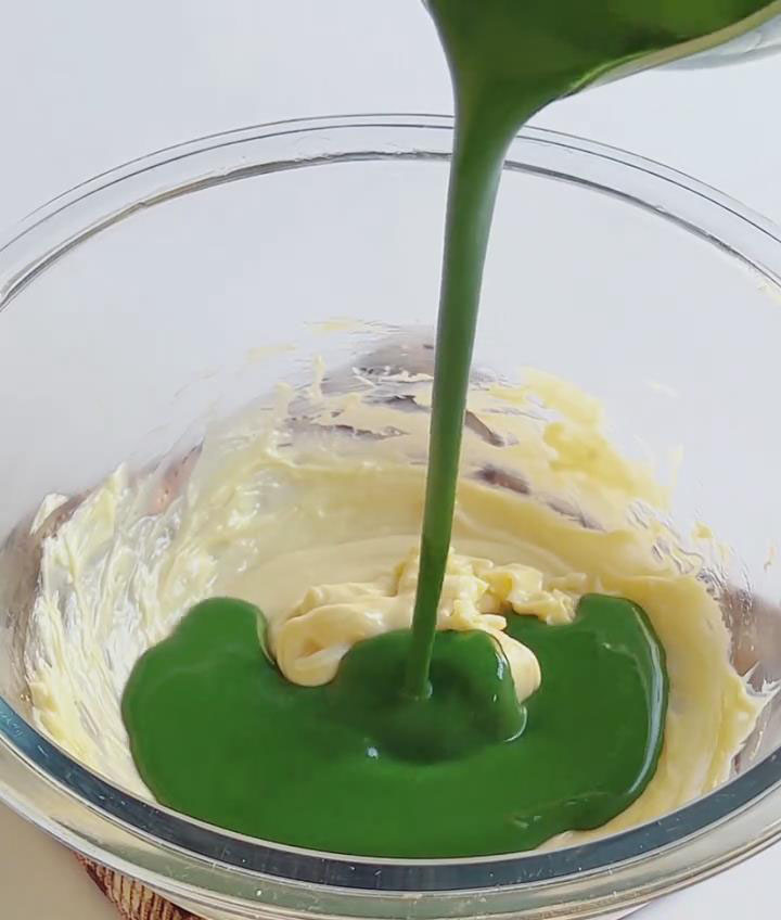 Fold the cooled matcha milk mixture into the cream cheese