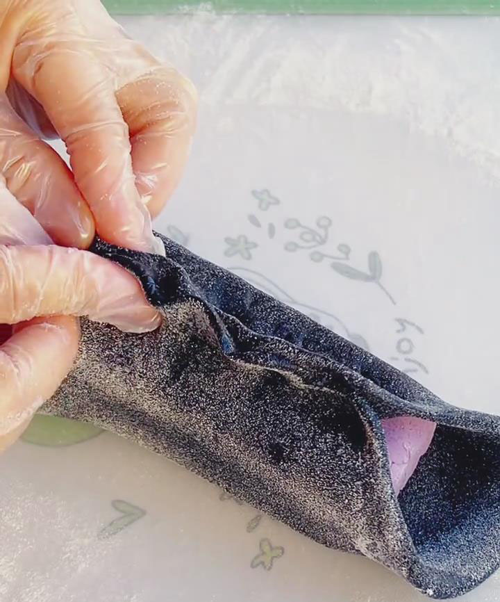 Fold the dough over the filling