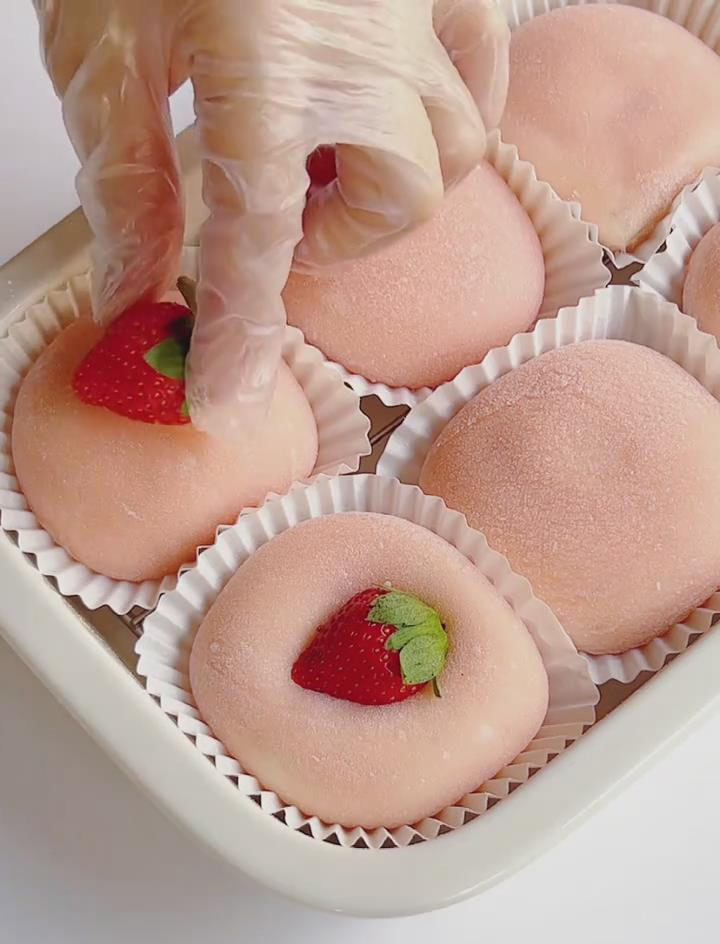Garnish with a halved or whole strawberry on top
