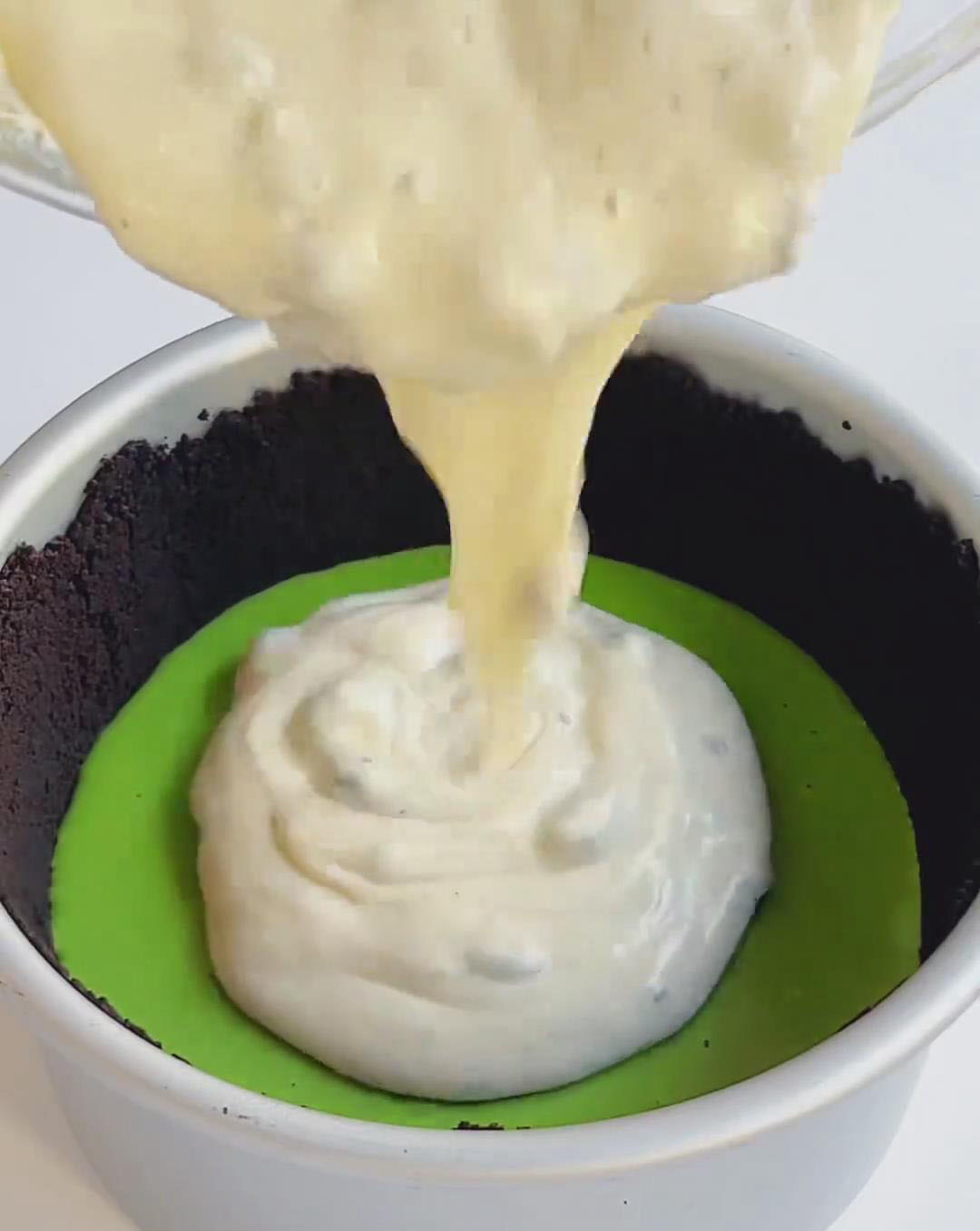 Gently pour over the matcha layer