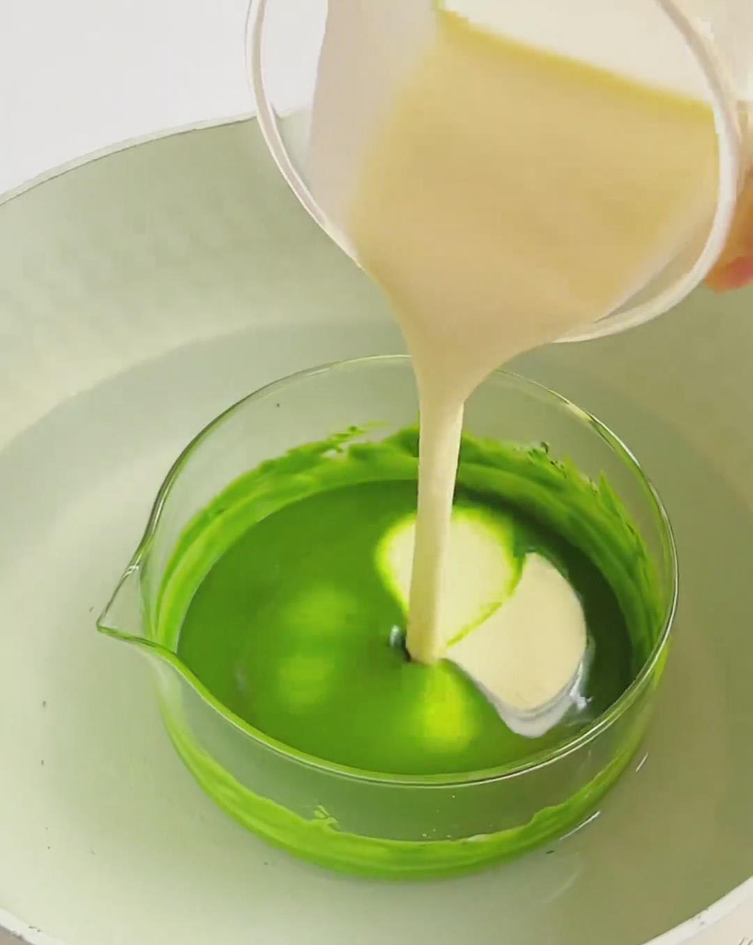 Gradually stir in 50g cream until glossy