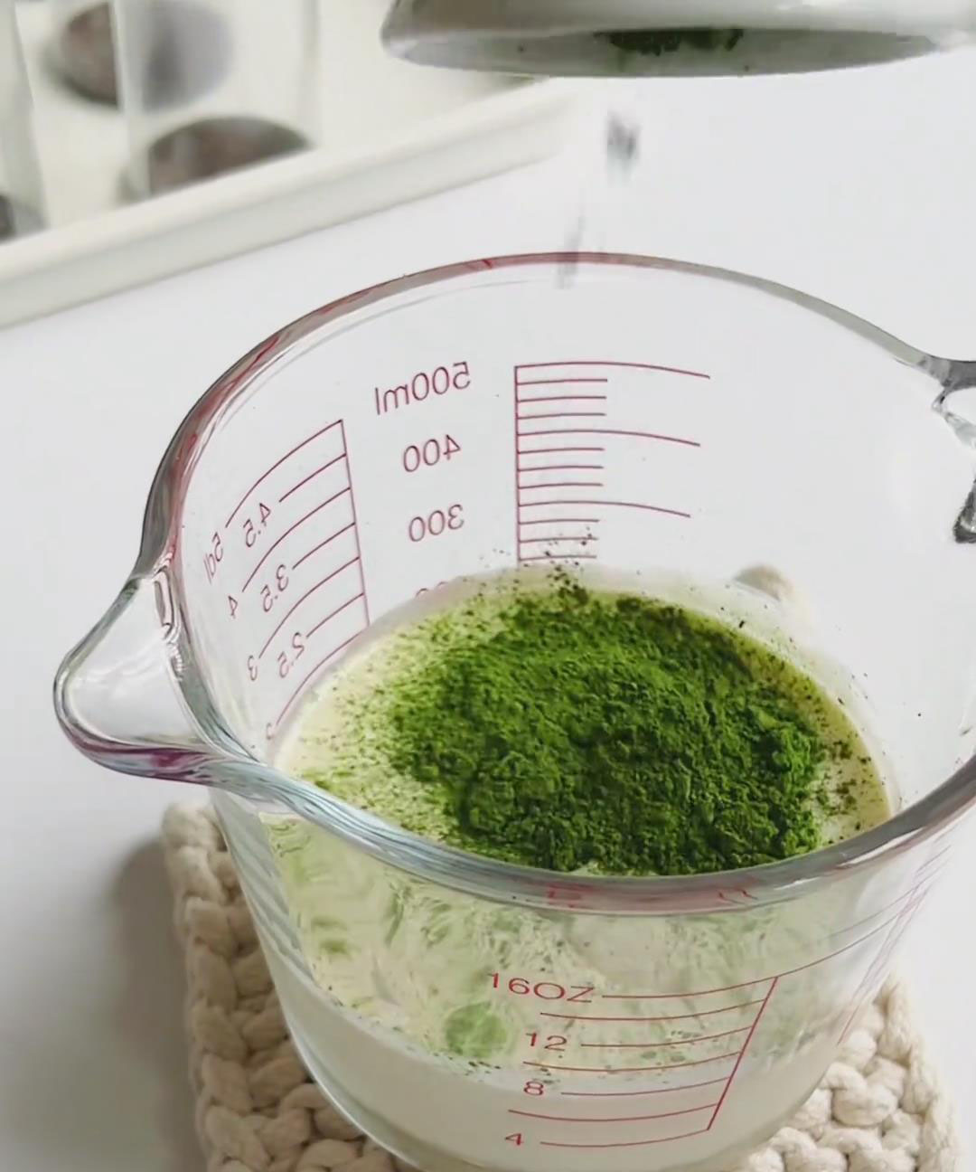 In a large mixing bowl, add the whipping cream, Oreo cream filling, and matcha powder