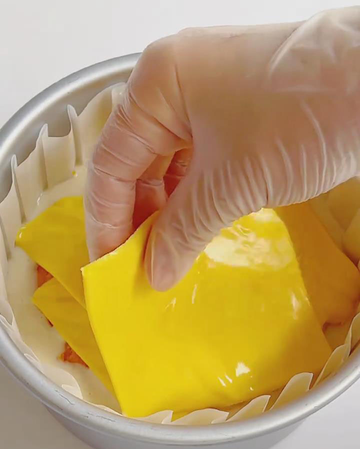 Layer cheese slices over the sweet potato new