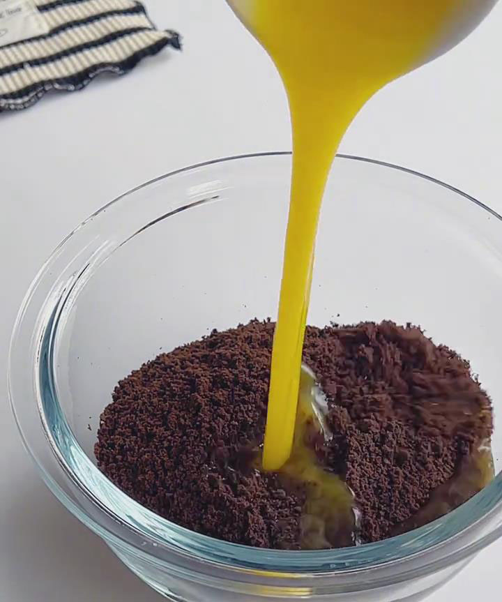 Mix Oreo crumbs with melted butter until evenly coated