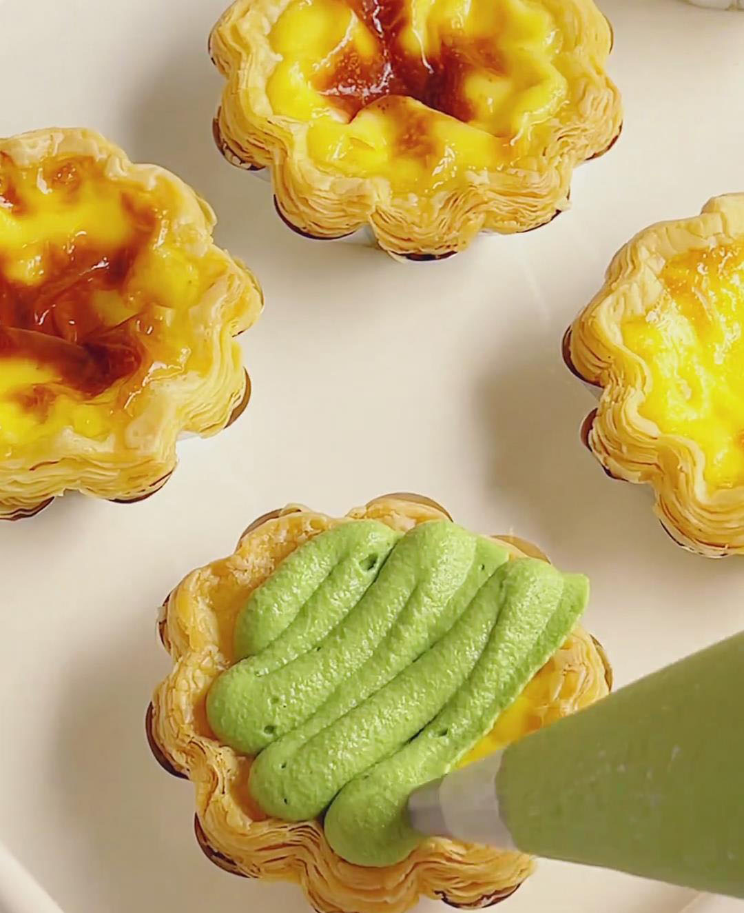 Pipe cream over cooled tarts