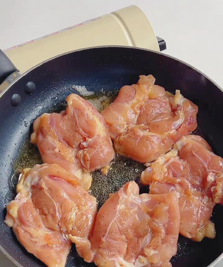 Place chicken skin side down