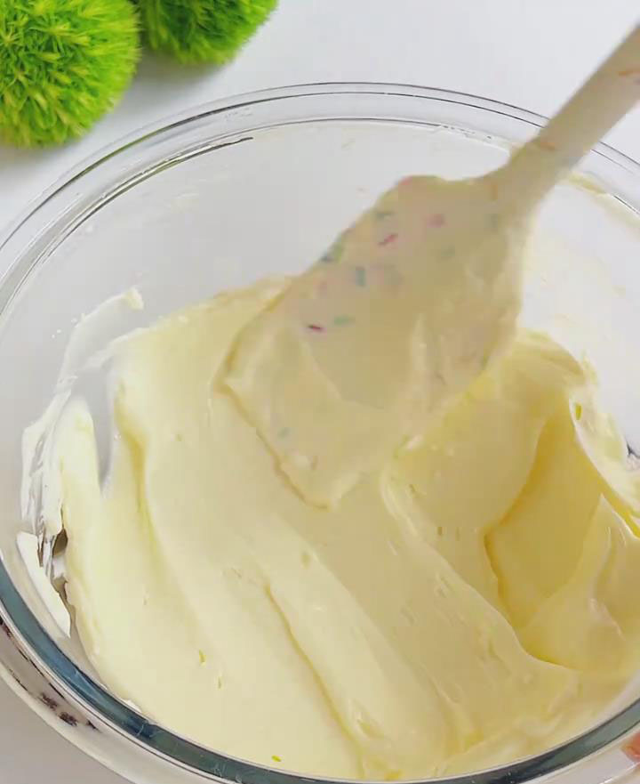 Place softened cream cheese in a bowl. Add sugar gradually, stirring until smooth and free of sugar grains