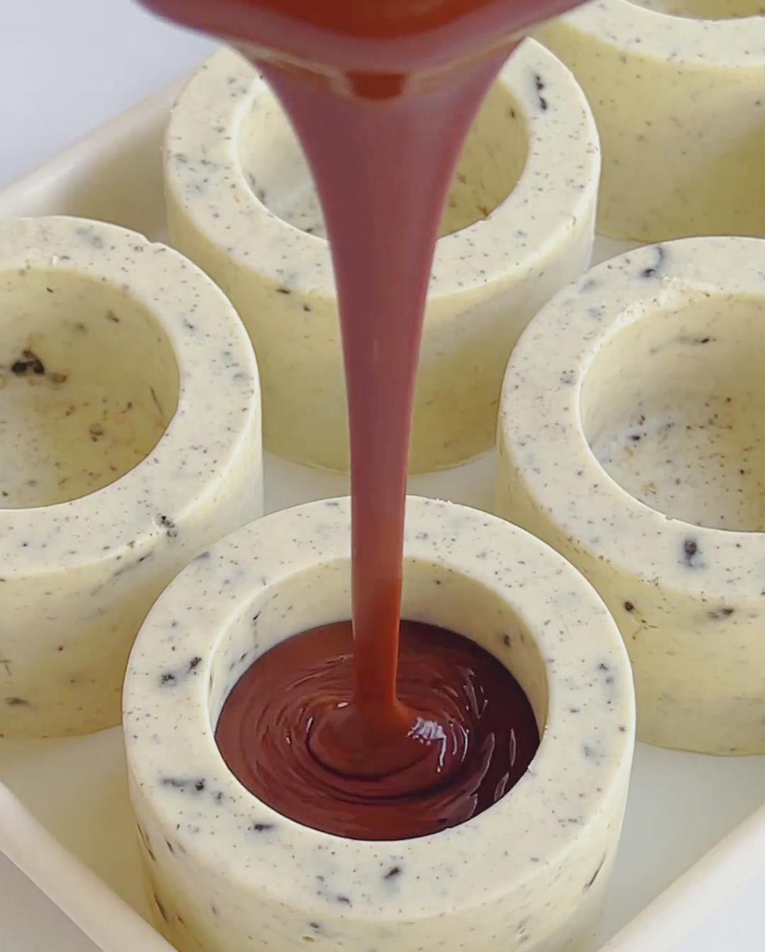 Pour cooled chocolate mixture on top of mousse