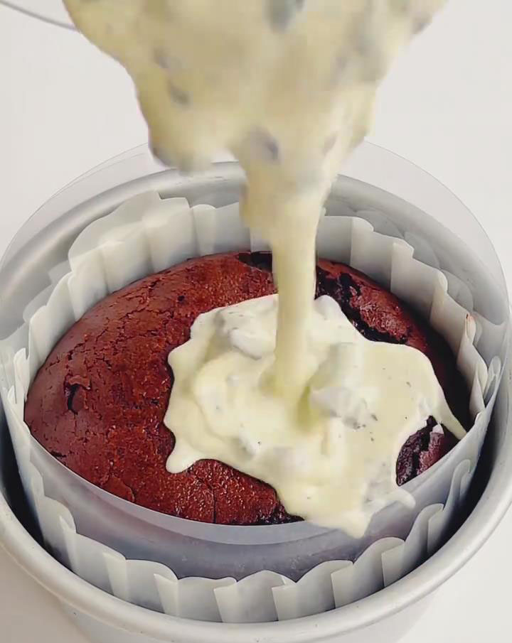 Pour the Oreo cheesecake mixture over the cooled brownie base