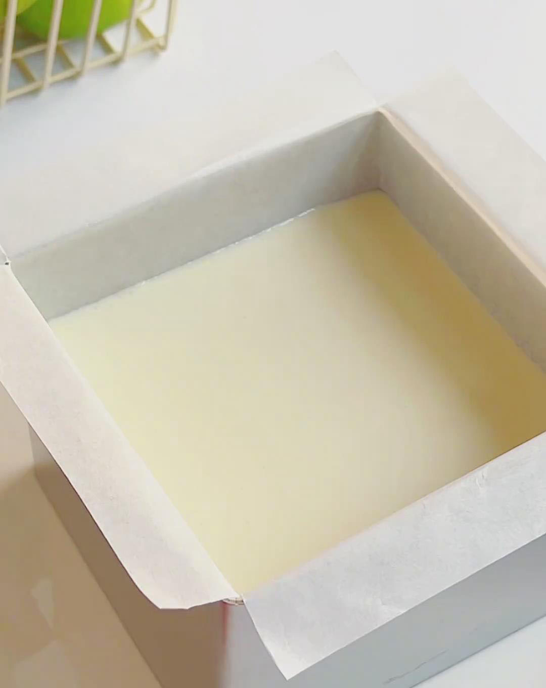 Pour the cheesecake mixture onto the chilled biscuit base