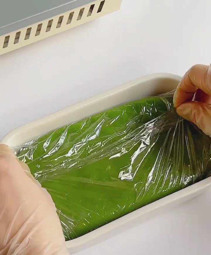 Press the dough into a square container lined with plastic wrap