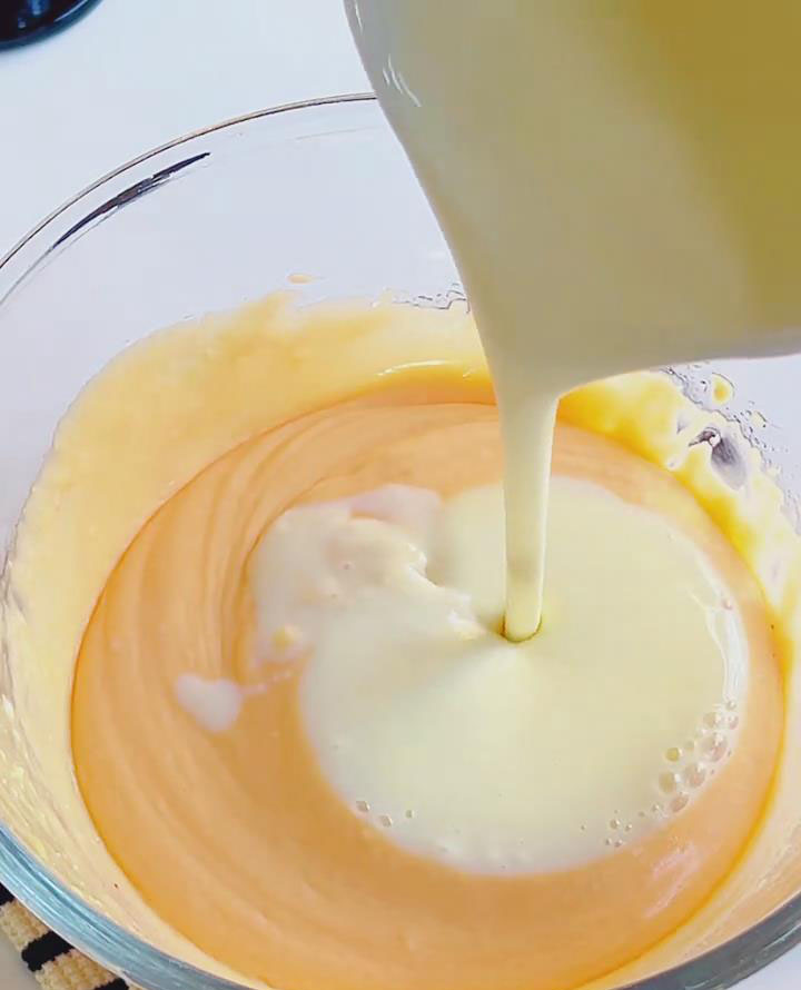 Slowly pour gelatin mixture into strawberry batter