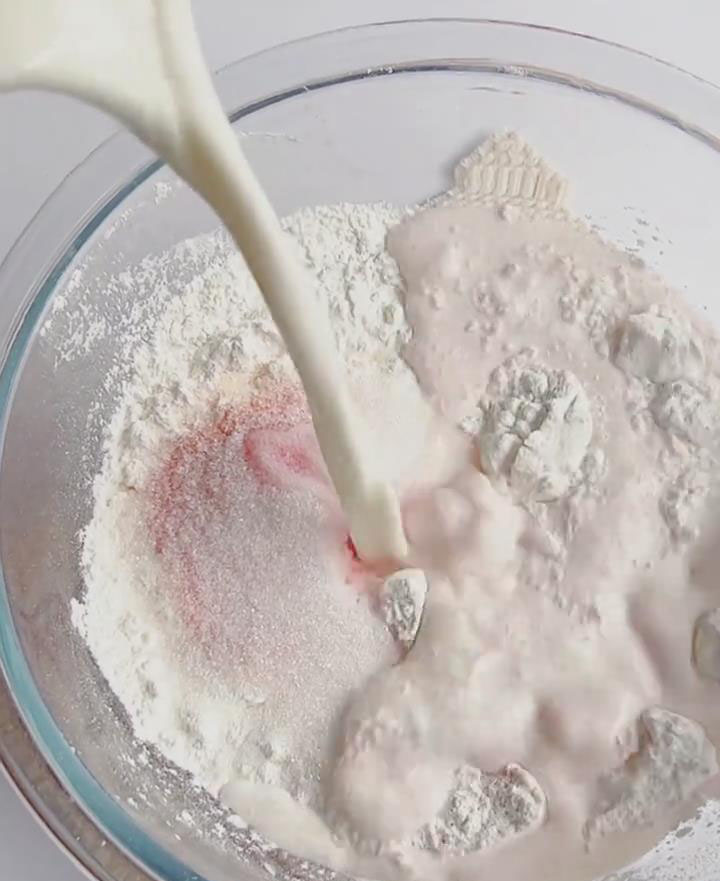 Slowly pour in the 180g of milk