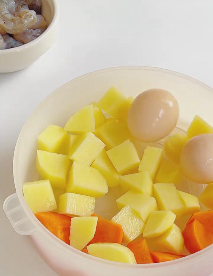 Steam potatoes, carrot, and eggs
