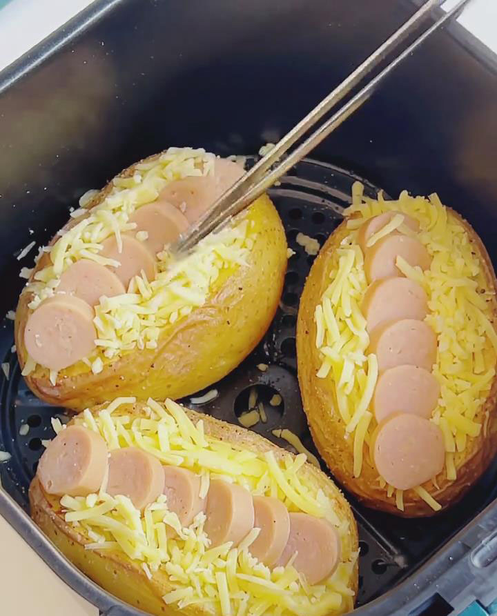 cover the sausage with shredded cheese