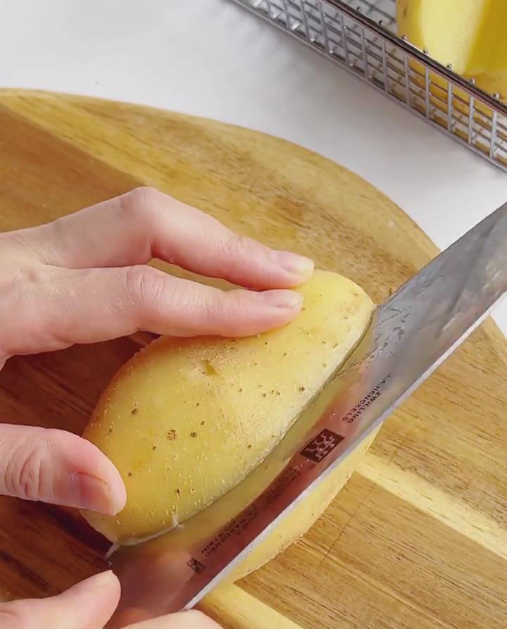 cut a V shaped pocket into each potato
