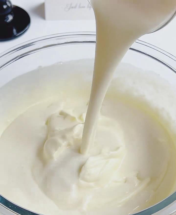 fold the warm gelatin milk mixture into the whipped cream