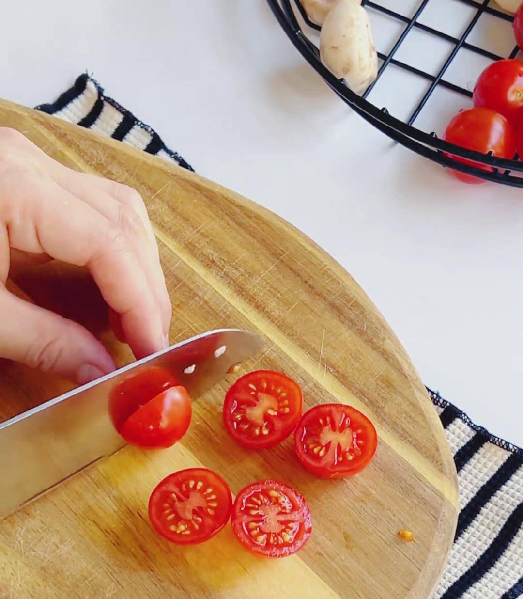 halve cherry tomatoes