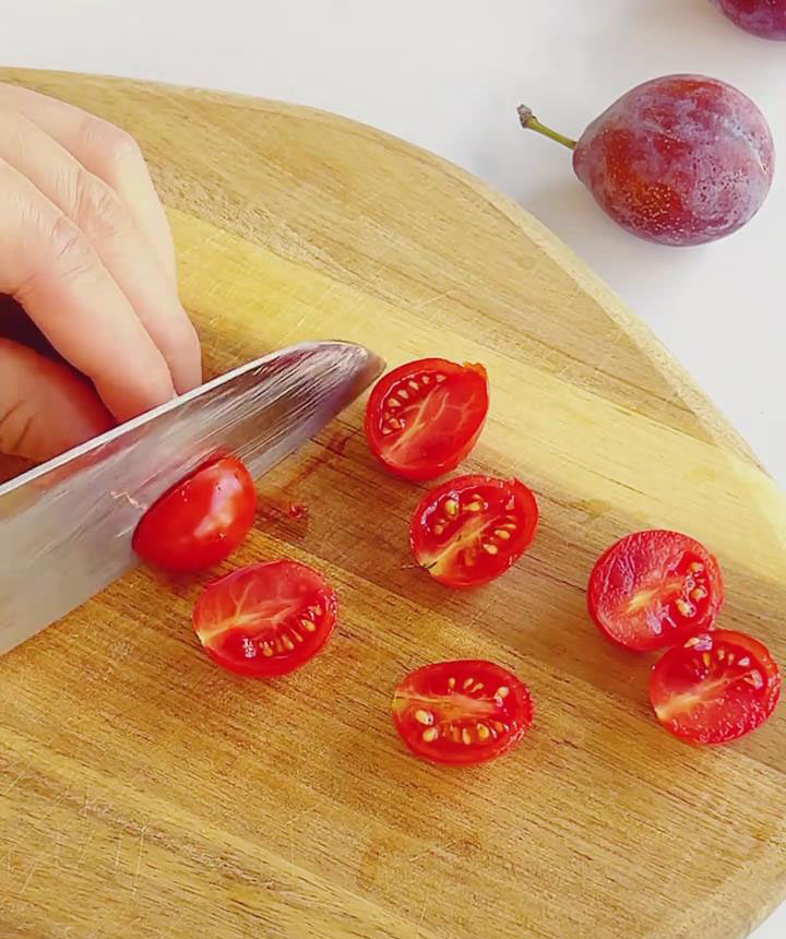 halve cherry tomatoes