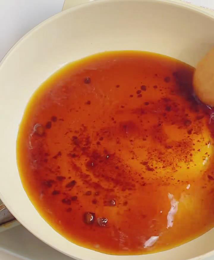 heat 50g brown sugar with 100ml water over medium heat