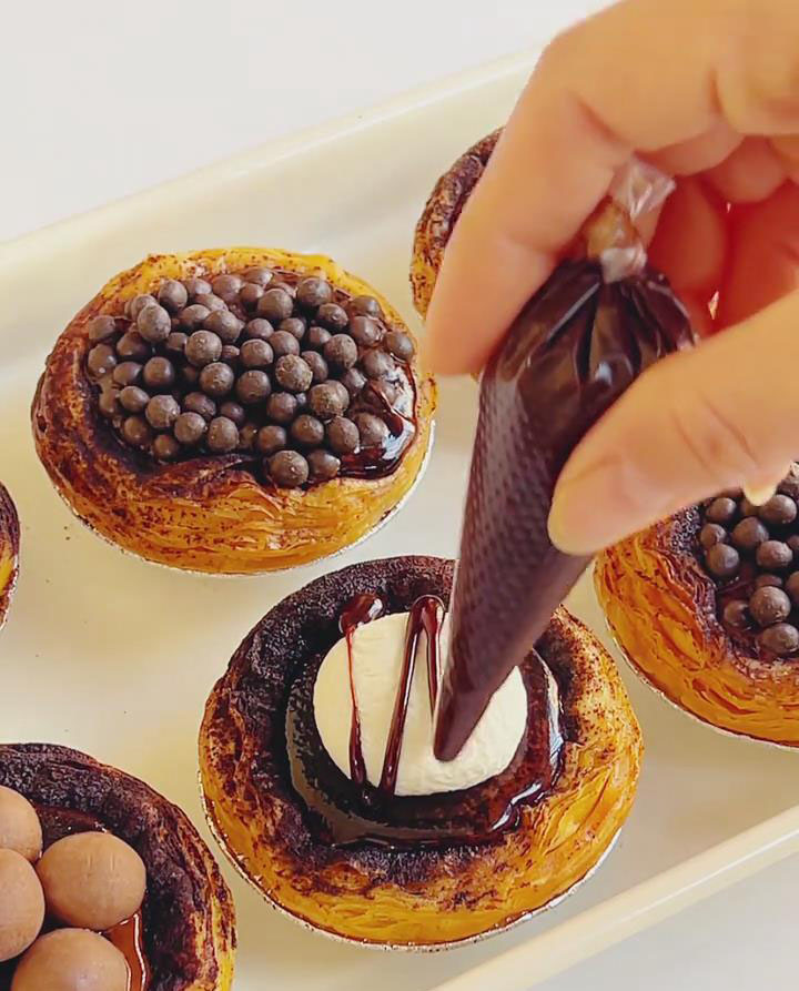 pipe the chocolate ganache in a grid pattern