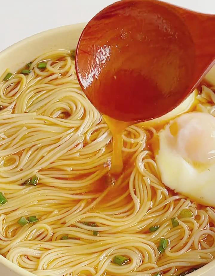 place the poached eggs on top of the noodles