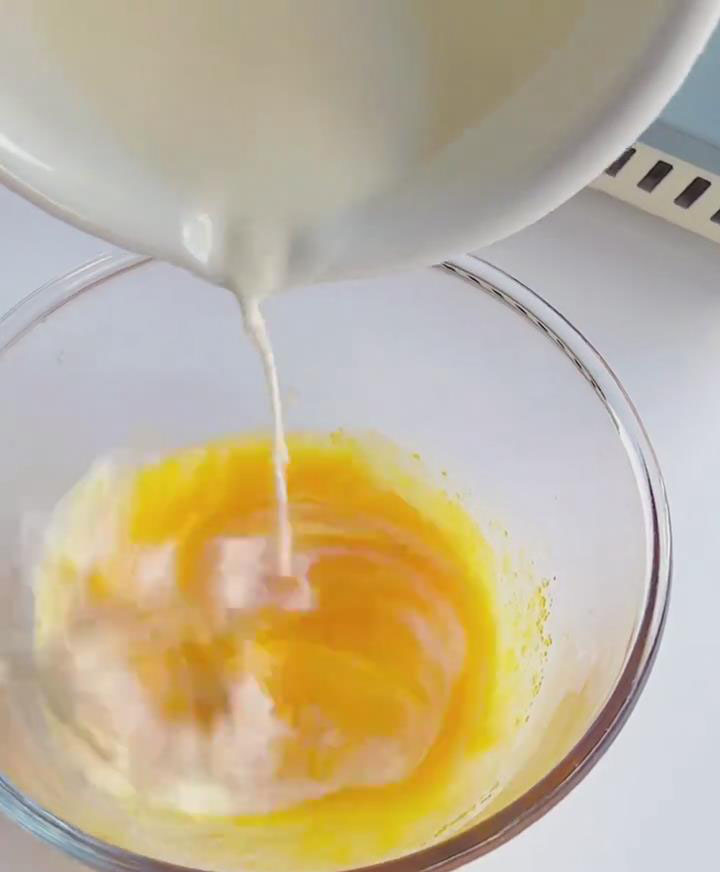 slowly pour into yolks while whisking
