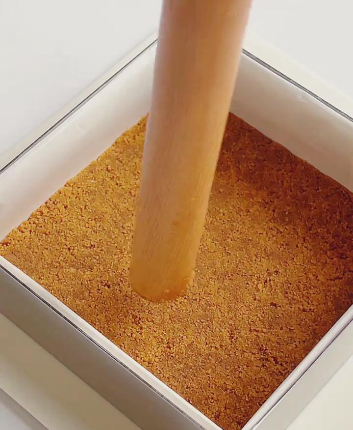 use a rolling pin to press the mixture down