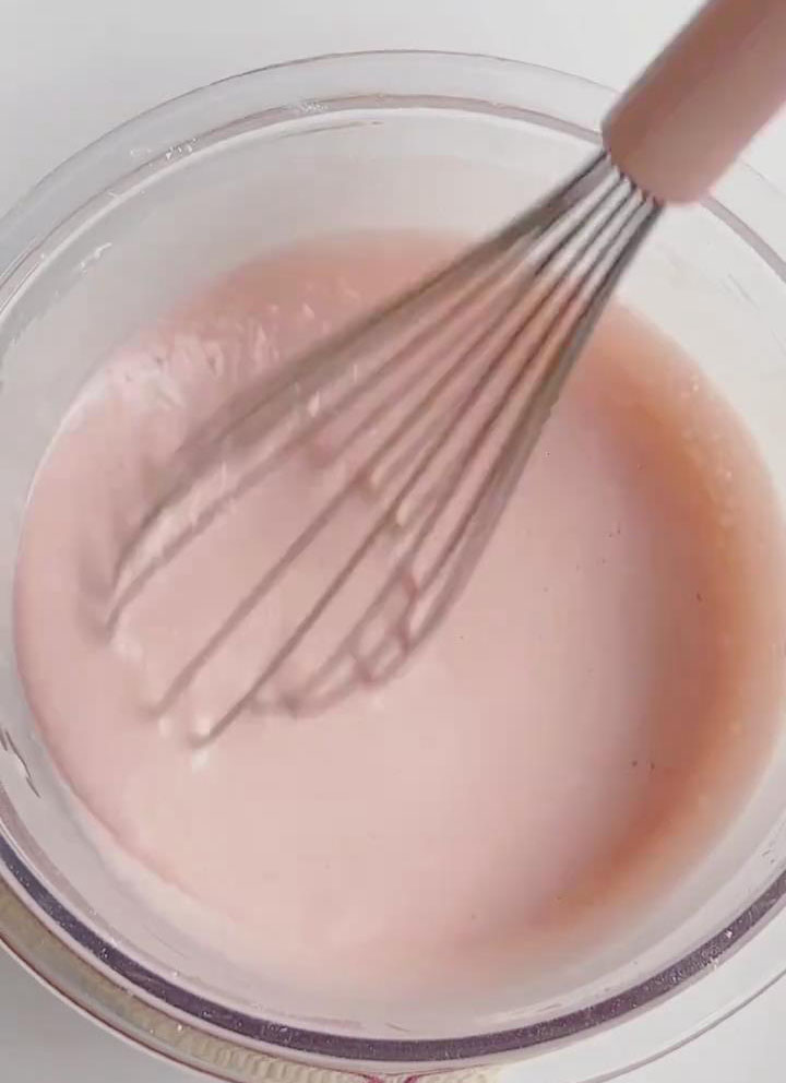 whisking clockwise until you have a smooth, lump free, pink batter
