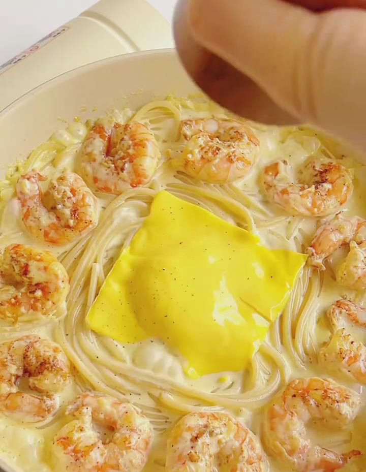 Add the second slice of cheese