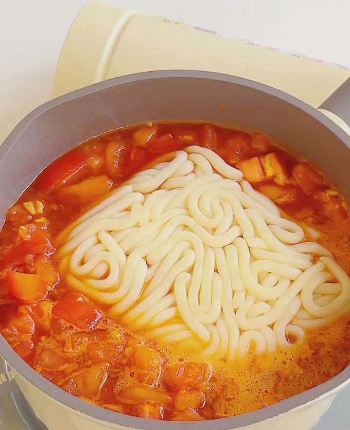 Add the udon noodles